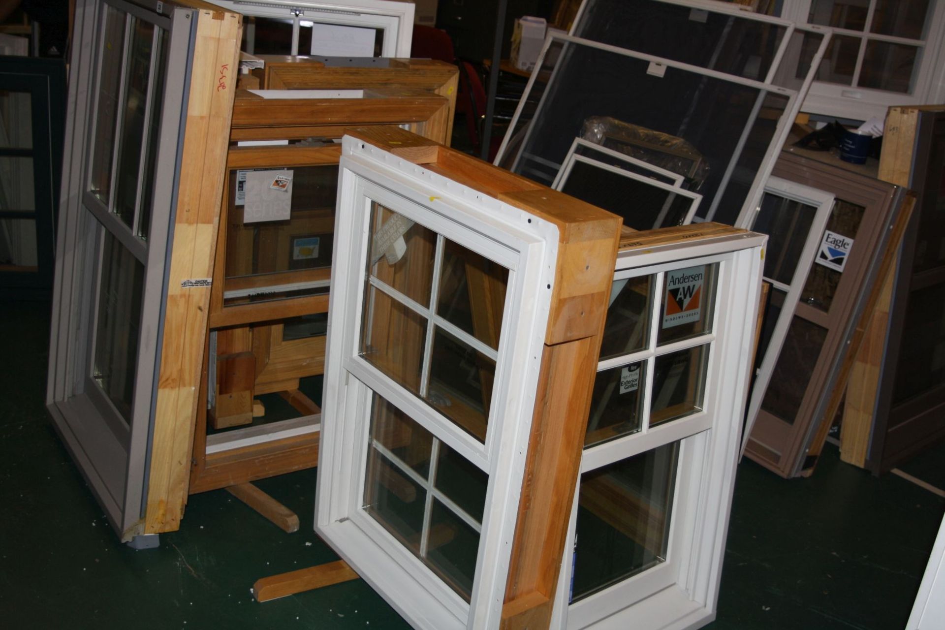 NINE DOUBLE GLAZED WINDOWS all mounted for display purposes. These include a white and pine Sash