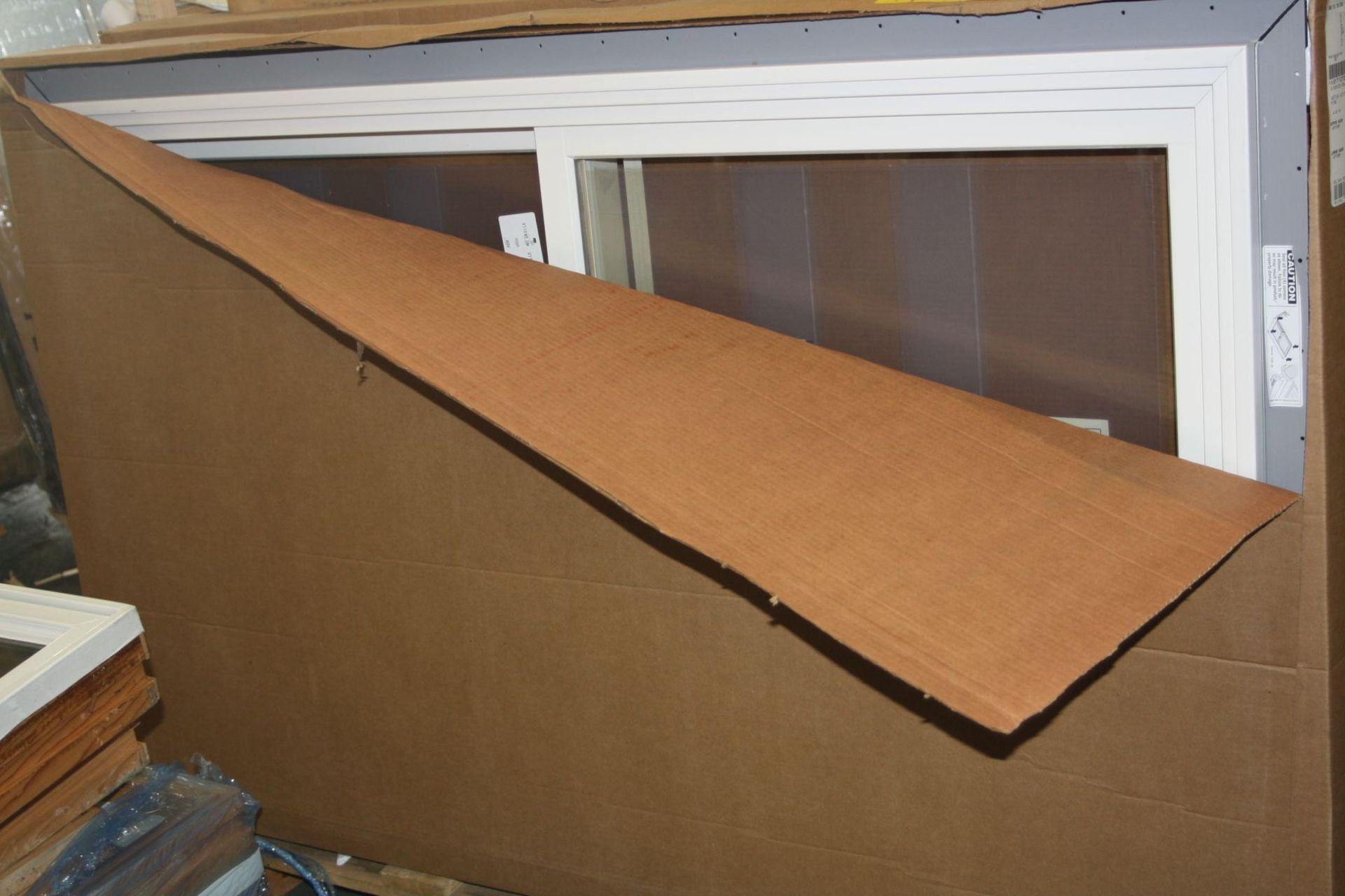 A BOXED ANDERSON DOUBLE HUNG WINDOW UNIT, in white, 159x97cm