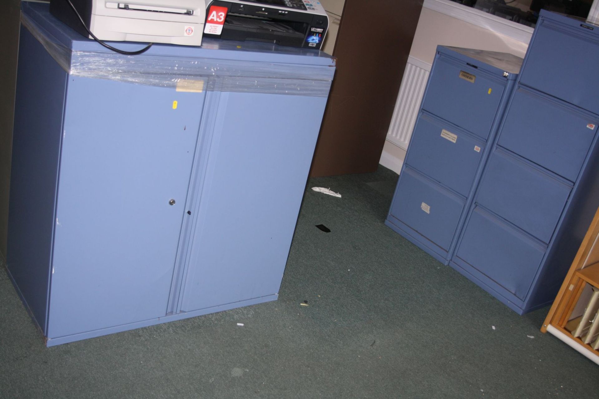 A THREE DRAWER, A FOUR DRAWER AND A TWO DOOR BLUE, metal office cabinets, (1 key)