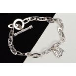 A MODERN ROBERTO COIN 18CT WHITE GOLD AND DIAMOND BRACELET, open oval flat links, fitted to a