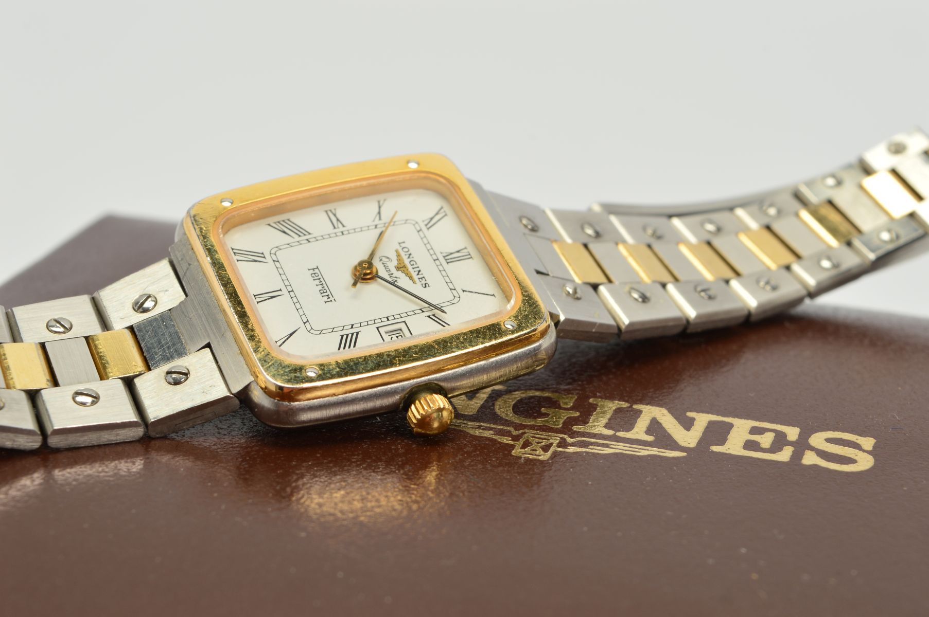 LONGINES FERRARI QUARTZ WATCH, two tone case and bracelet, white Roman ...