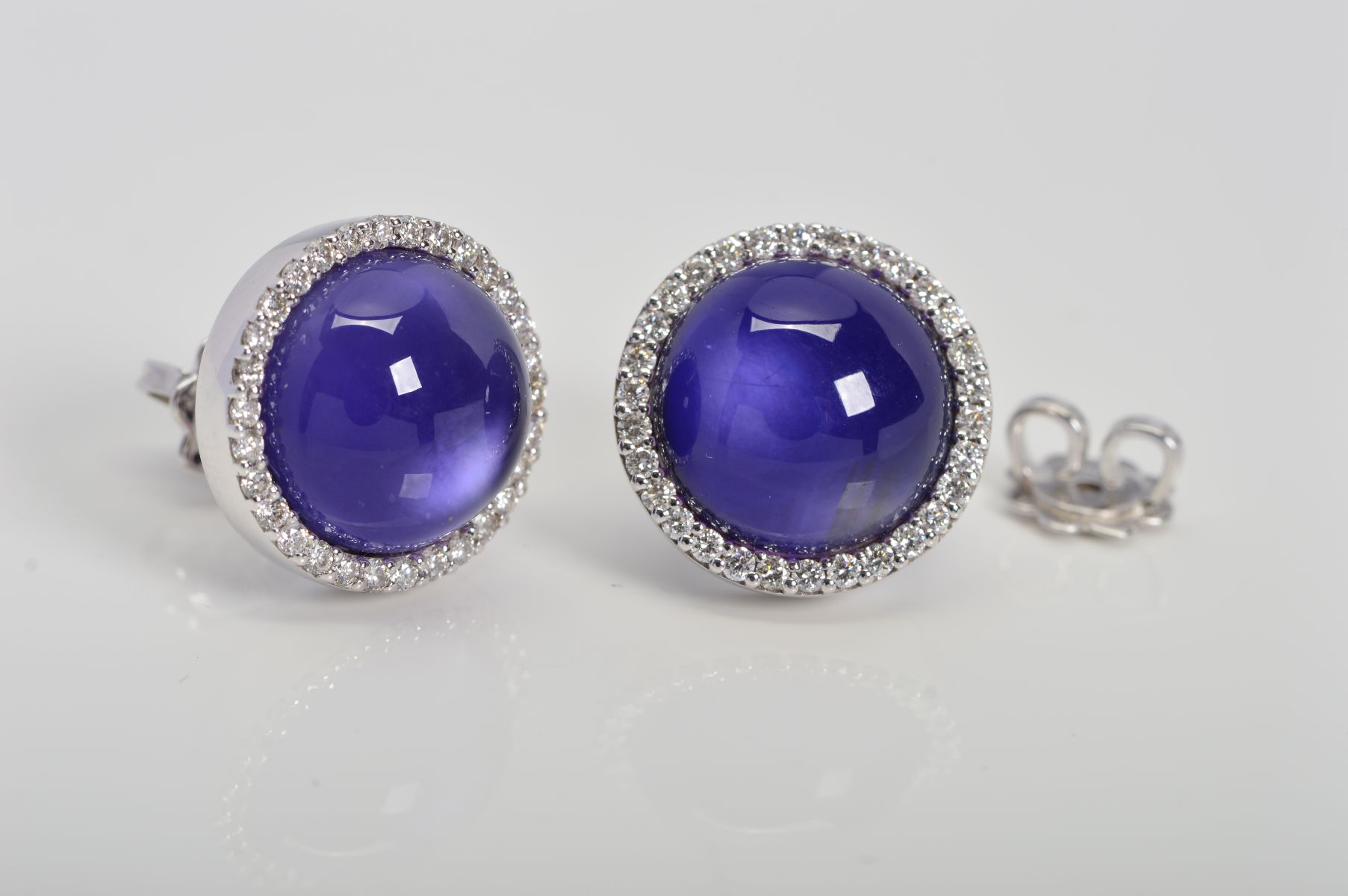 A MODERN PAIR OF ROBERTO COIN 18CT WHITE GOLD AMETHYST AND DIAMOND STUD EARRINGS, centring on a