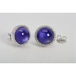 A MODERN PAIR OF ROBERTO COIN 18CT WHITE GOLD AMETHYST AND DIAMOND STUD EARRINGS, centring on a