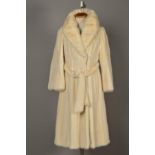 AN AZURENE MINK COAT, with wide lapel collar, waist tie belt, inner tie ribbon, two exterior