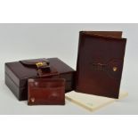 A BROWN ROLEX BUCKLE DESIGN WATCH BOX, wooden interior, serial number 71.00.04, with a brown leather