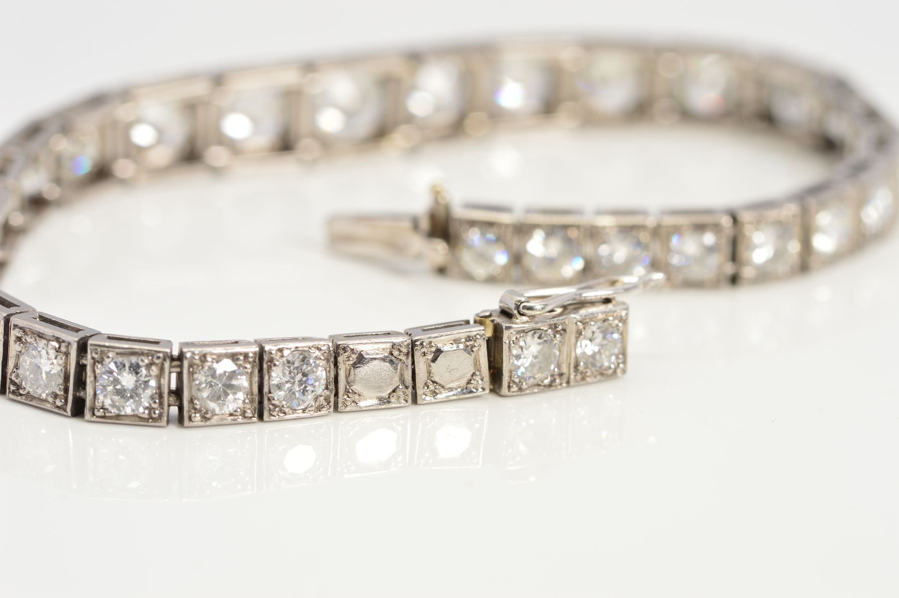 AN ART DECO GRADUATED DIAMOND LINE BRACELET, brilliant cut diamonds, each set to a box setting - Image 5 of 7
