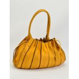 LUPO YELLOW LEATHER SHOULDER BAG, of pleated design gathered at the top by two leather cords, the