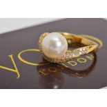 A MODERN YOKO GOLD CULTURED PEARL AND DIAMOND DRESS RING, centring on an Akoya cultured pearl