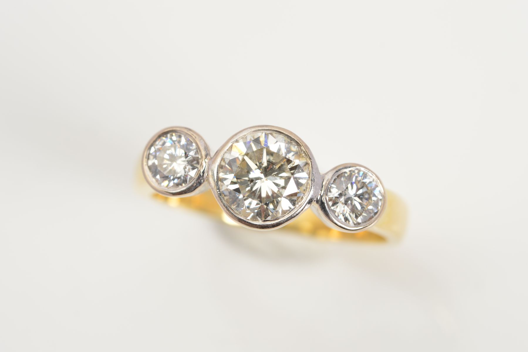 AN 18CT GOLD THREE STONE DIAMOND RING, designed as three brilliant cut diamonds within collet - Image 4 of 6
