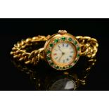 AN EARLY 20TH CENTURY GOLD EMERALD AND DIAMOND WATCH, round case measuring approximately 25.0mm in