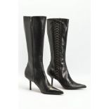 A PAIR OF CHRISTIAN DIOR KNEE HIGH BLACK LEATHER HEELED BOOTS, designed with pointed toes, laced