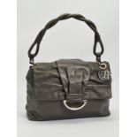 CHRISTIAN DIOR GREY HANDBAG, designed with front flap and press stud closure, silver tone