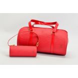 LOUIS VUITTON RED EPI SOUFFLOT HANDBAG WITH MATCHING POUCH, of cylindrical shape with small inner