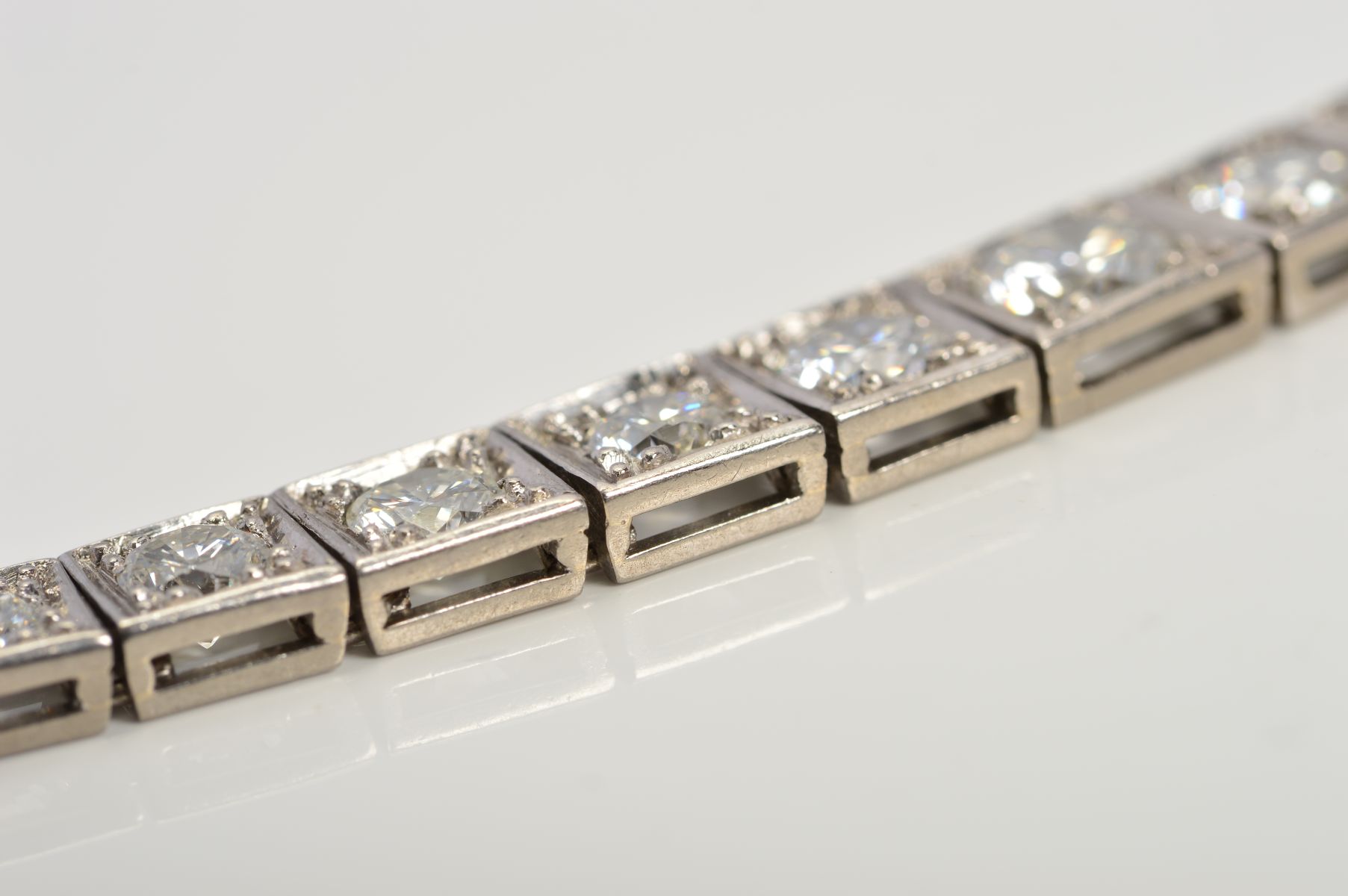 AN ART DECO GRADUATED DIAMOND LINE BRACELET, brilliant cut diamonds, each set to a box setting - Image 3 of 7