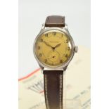 A 1940'S MECHANICAL JAEGER - LECOULTRE, steel case and winder, very discoloured Arabic dial with