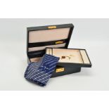 A ROLEX WATCH AND JEWELLERY BOX, faded navy blue leather exterior, yellow metal corners and lock