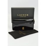 LAUNER LONDON BLACK PATENT LEATHER ZIP ROUND PURSE, opening to reveal concertina compartment with