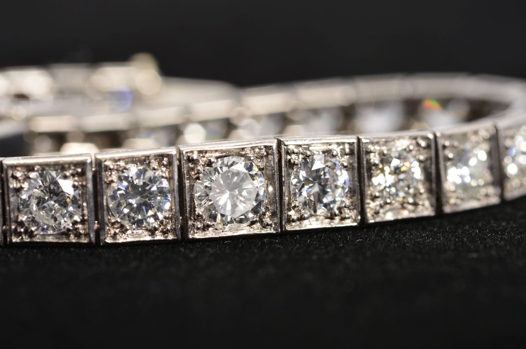 AN ART DECO GRADUATED DIAMOND LINE BRACELET, brilliant cut diamonds, each set to a box setting - Image 7 of 7