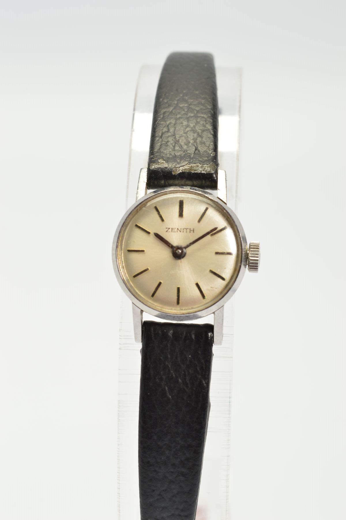 A ZENITH MECHANICAL LADIES COCKTAIL WRISTWATCH, silver baton dial, stainless steel case on a black