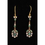 A PAIR OF EMERALD AND DIAMOND DROP EARRINGS, each designed with a floral emerald and diamond panel