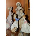 A LLADRO FIGURE, 'PARISIAN LADY', No 5321, by Jose Puche (parasol loose), together with four Nao