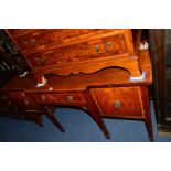 A GEORGIAN MAHOGANY, ROSEWOOD BANDED AND SATINWOOD STRUNG BREAKFRONT SIDEBOARD, flanked by