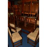 AN OAK REFECTORY TABLE, and four dark Ercol chairs and a set of reproduction oak dining chairs,