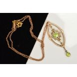 AN EARLY 20TH CENTURY PERIDOT AND SEED PEARL PENDANT, open work design, pendant measuring