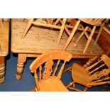 A PINE KITCHEN TABLE with a single drawer, width 152cm x depth 83cm x height 76.5cm and four beech