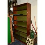 AN OAK GLAZED SLIDING SEVEN TIER BOOKCASE, height 206cm x width 104cm