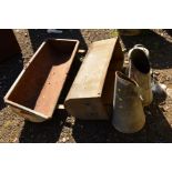 A COLLECTION OF GALVANISED ITEMS comprising of two pig troughs, chicken feeder and two milk jugs (
