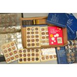 A BOX OF UK COINAGE, contained in three albums and a box of sleeved envelopes, to include copper,