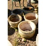 THREE MATCHING COMPOSITE CIRCULAR PLANTERS, diameter 39cm x height 30cm, together with a pair of