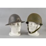 AN AMERICAN ISSUE J.S.S. STEEL MILITARY HELMET, dated 1941, grey colour with inner leather