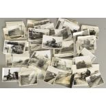 A QUANTITY OF APPROXIMATELY 150 BLACK AND WHITE PHOTOGRAPHS, mainly approximately postcard size,