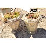 A PAIR OF OCTAGONAL ECCLESIASTICAL STONE TAPERED PLANTERS with quatrefoil design, diameter 60cm x