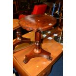 A VICTORIAN WALNUT OCCASIONAL TABLE, the shaped rectangular top on an octagonal and turned pedestal,
