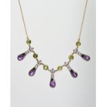 AN AMETHYST, PERIDOT, DIAMOND AND SPLIT PEARL NECKLACE, designed as five tapered and scrolling
