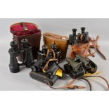 FIVE PAIRS OF MILITARY BINOCULARS, all in their cases, Voigtlander 6 x 30, Ross 'Stepsak' 10 x 50,