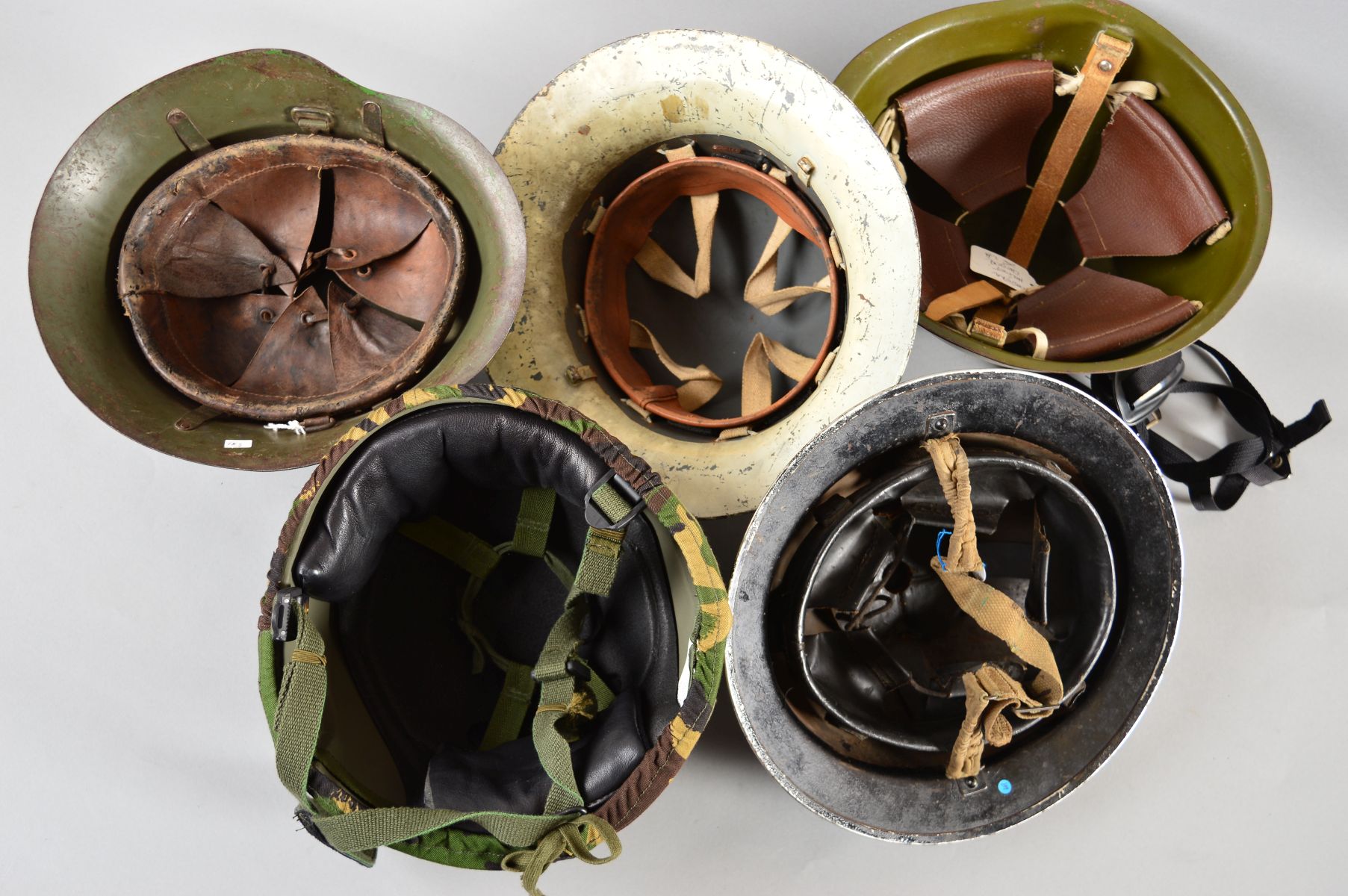 A BOX CONTAINING FIVE MILITARY HELMETS, as follows, Post War WWII era Eastern Block helmet, green - Image 6 of 8