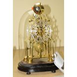 A LATE 19TH CENTURY BRASS SKELETON CLOCK, of cathedral form, the pinnacle with bell which is