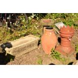 A TERRACOTTA CHIMNEY POT, diameter 31cm x height 62cm, together with a terracotta urn, composite