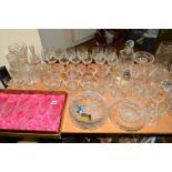 A GROUP OF CUT GLASS etc to include bowls, decanter, vase, drinking glasses, carafe etc
