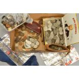 A BOX OF MOSTLY UK COINS, to include a purse of silver coins