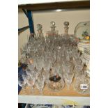 A COLLECTION OF GLASSWARE INCLUDING A PAIR OF BOXED TUDOR CRYSTAL SALAD SERVERS, three decanters and