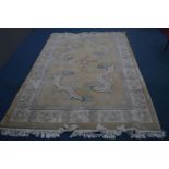 A CHINESE WOOLLEN CARPET SQUARE, with central dragon detail, 275cm x 183cm, together with a