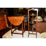 AN OAK OVAL TOPPED DROP LEAF TABLE with a lever mechanism and a mahogany cake stand (2)