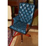 A BUTTONED BLUE UPHOSTERED SWIVEL OFFICE GAINSBOROUGH CHAIR