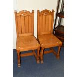 A PAIR OF EARLY 20TH CENTURY OAK HALL CHAIRS with slatted backs