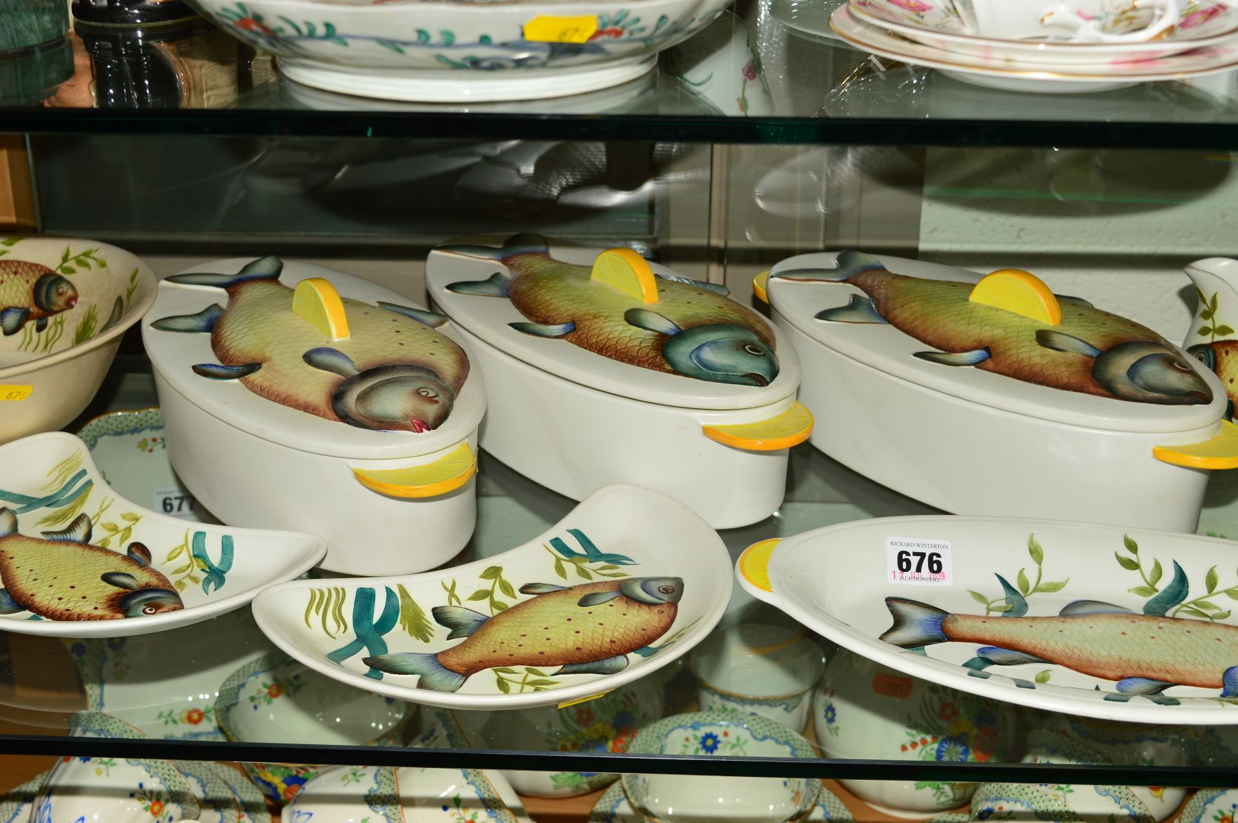 RADFORD POTTERY PART DINNER SERVICE, fish and lemons design, comprising three tureens, two sauce